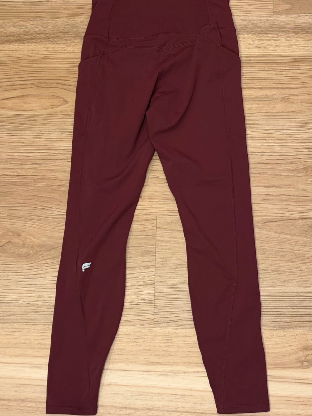 3/$15 Fabletics High-Rise Burgundy Leggings with Side Pockets - Picture 2 of 3